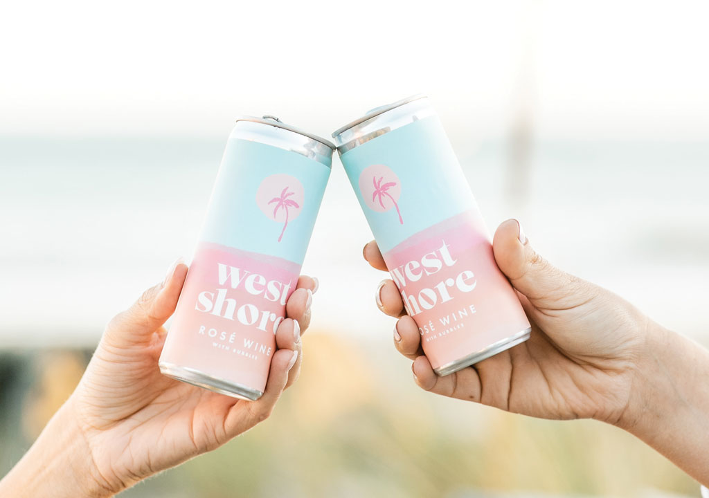 West Shore Wine cans toasting