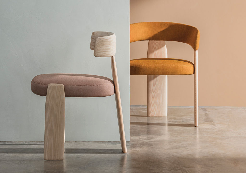 two modern andreu world chairs