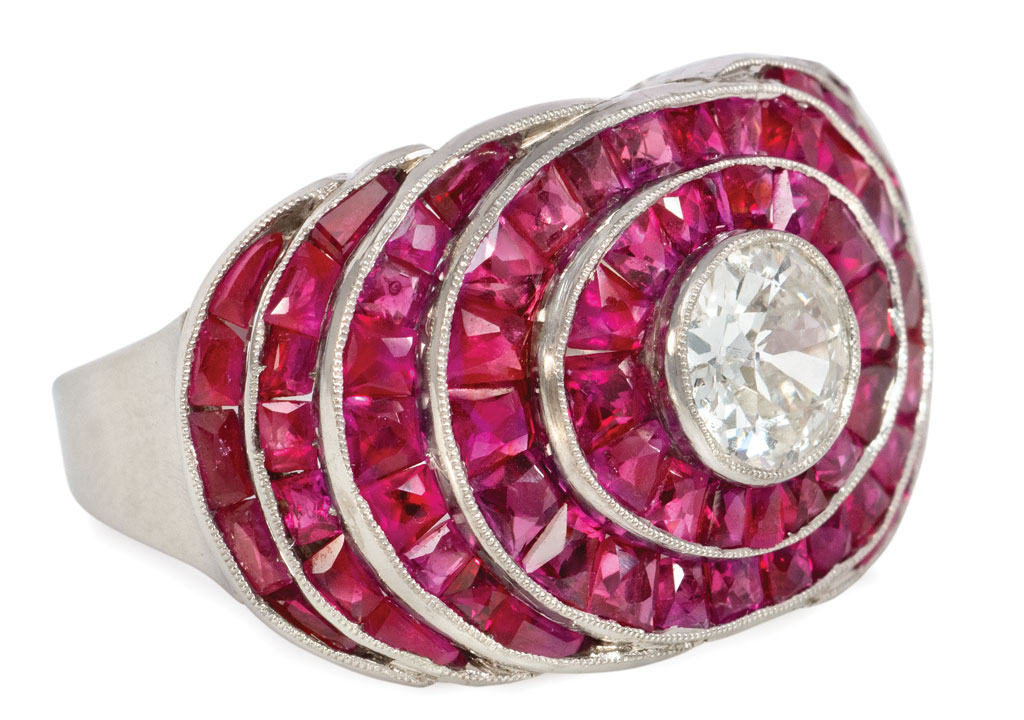 large art deco ring with rubies surrounding a diamond