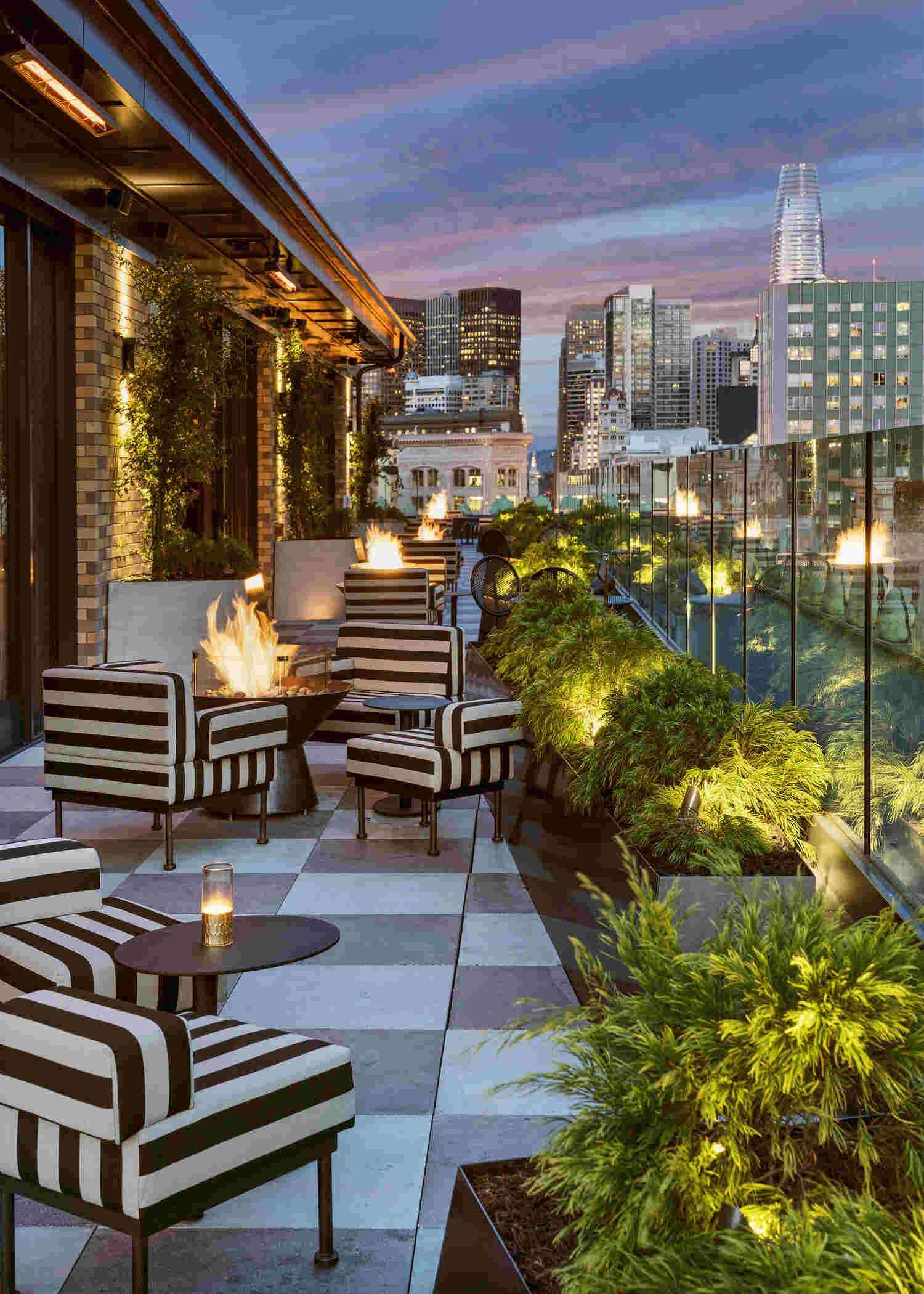 charmaine's san francisco rooftop bar overlooking evening city view