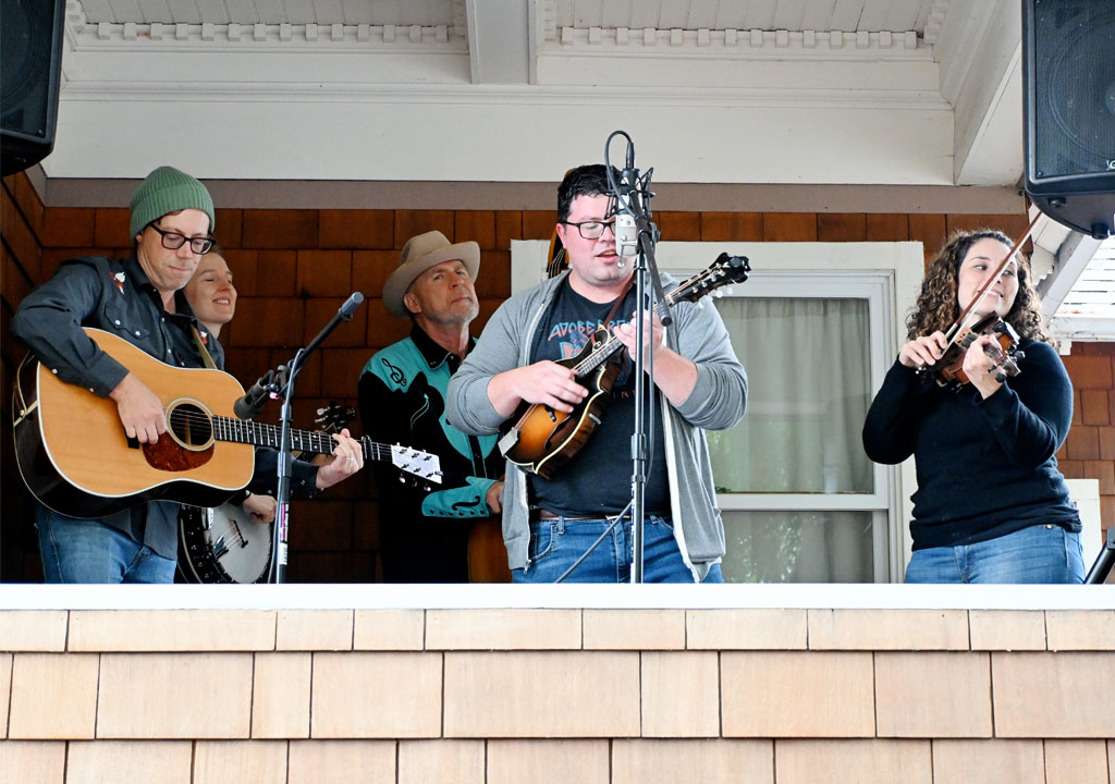 string band plays on a porch