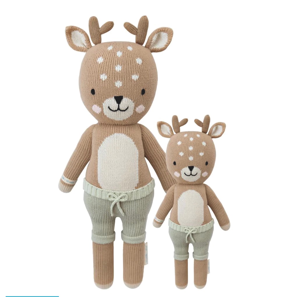 pair of stuffed fawns wearing shorts