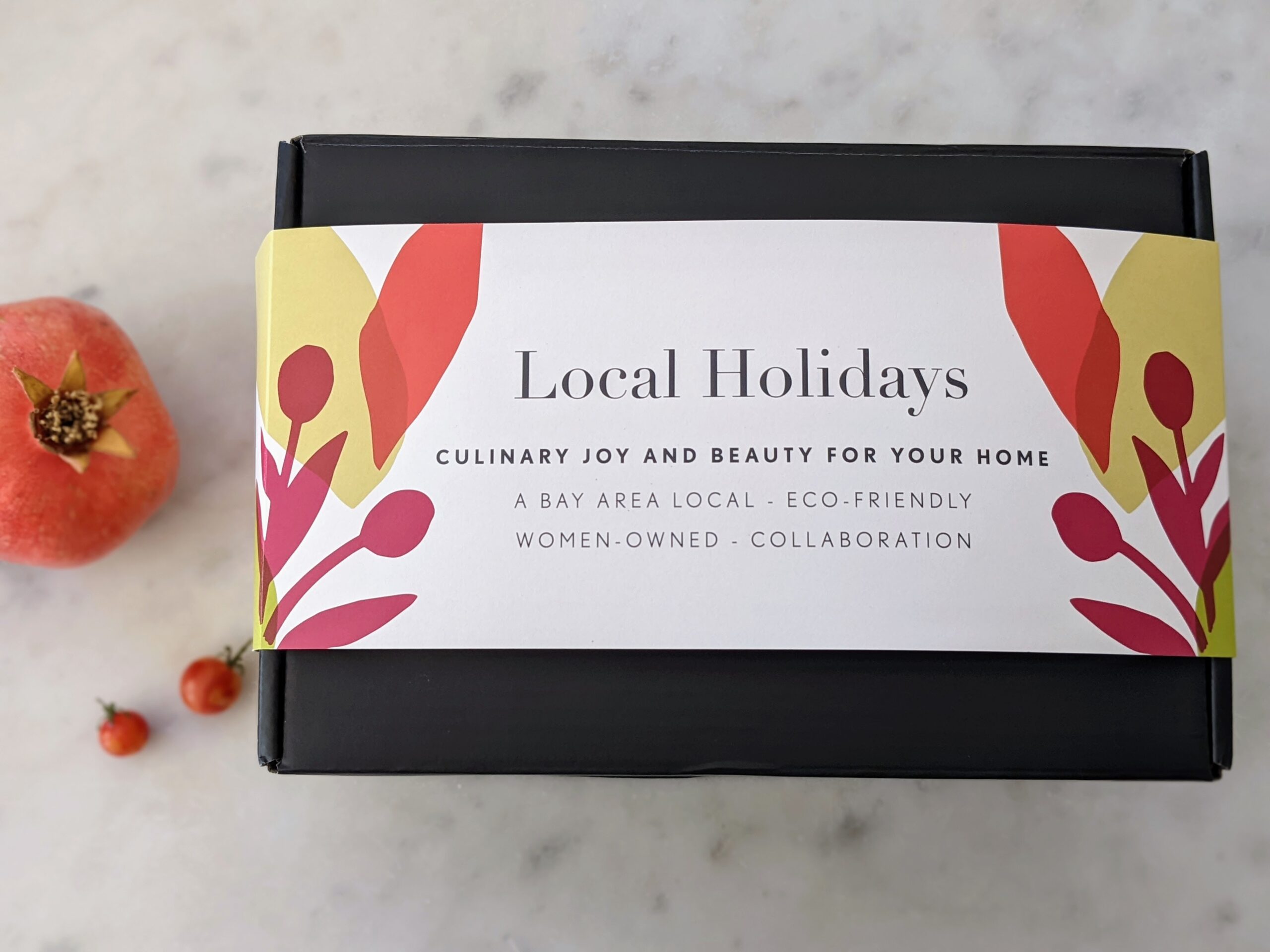 local holidays label on black gift box
