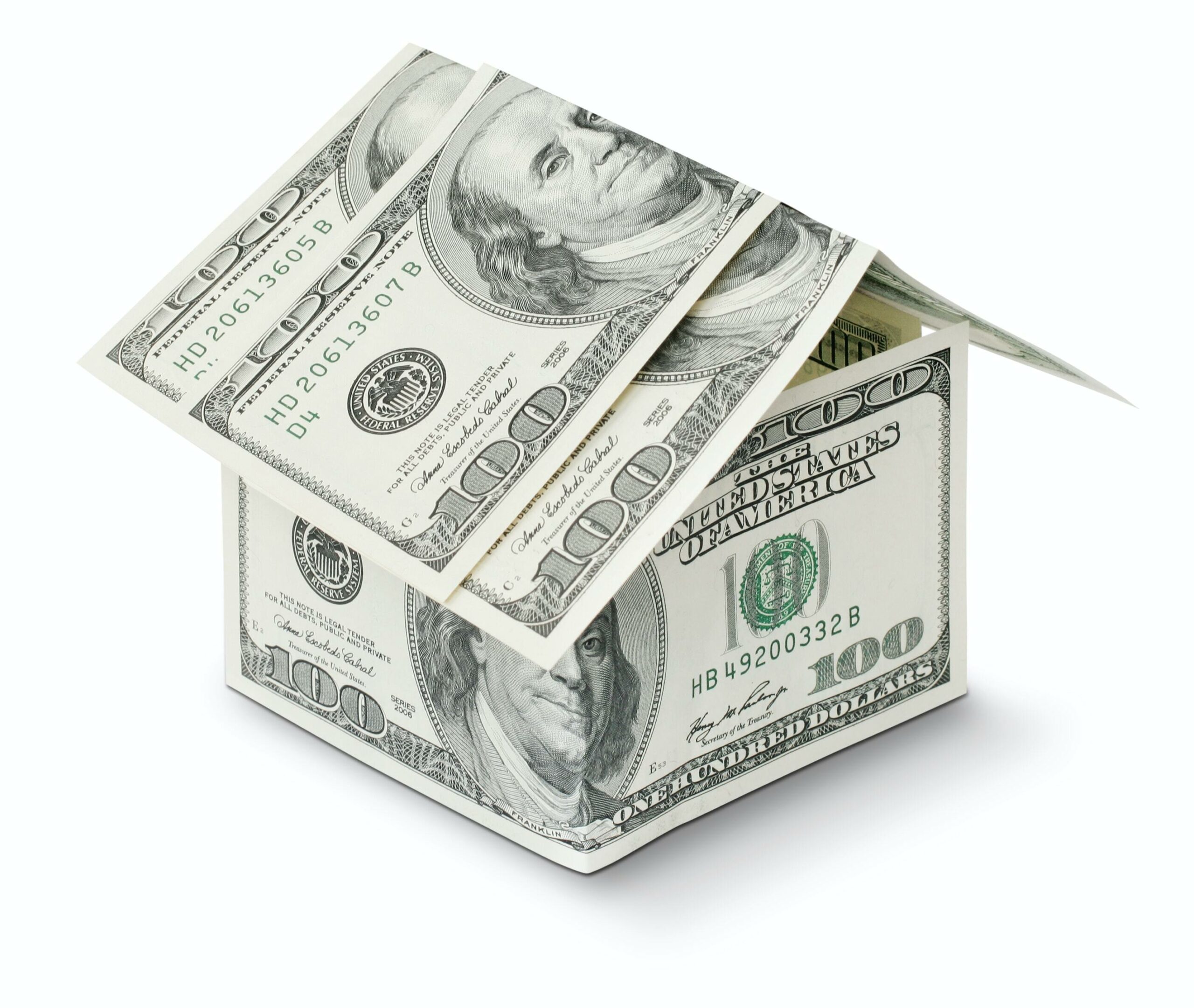 stock image of hundred dollar bills constructed like a house