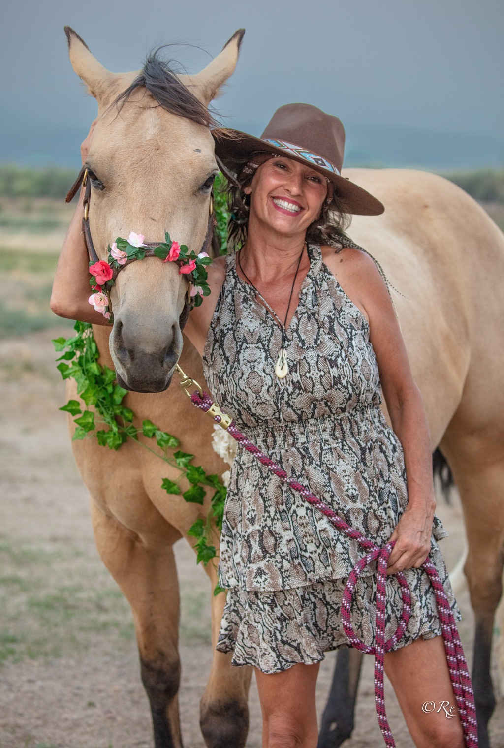 melinda starr posing with horse