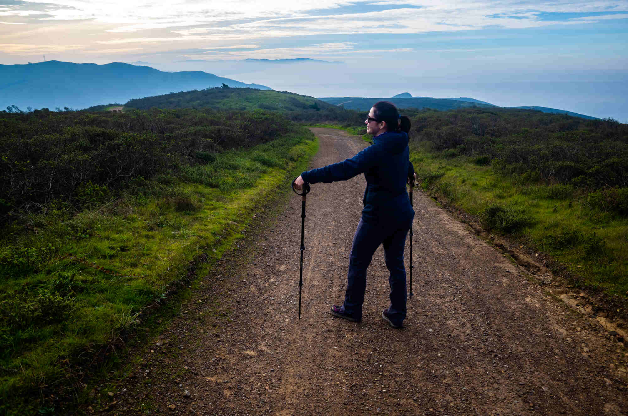 a woman hiking on a Marin trail