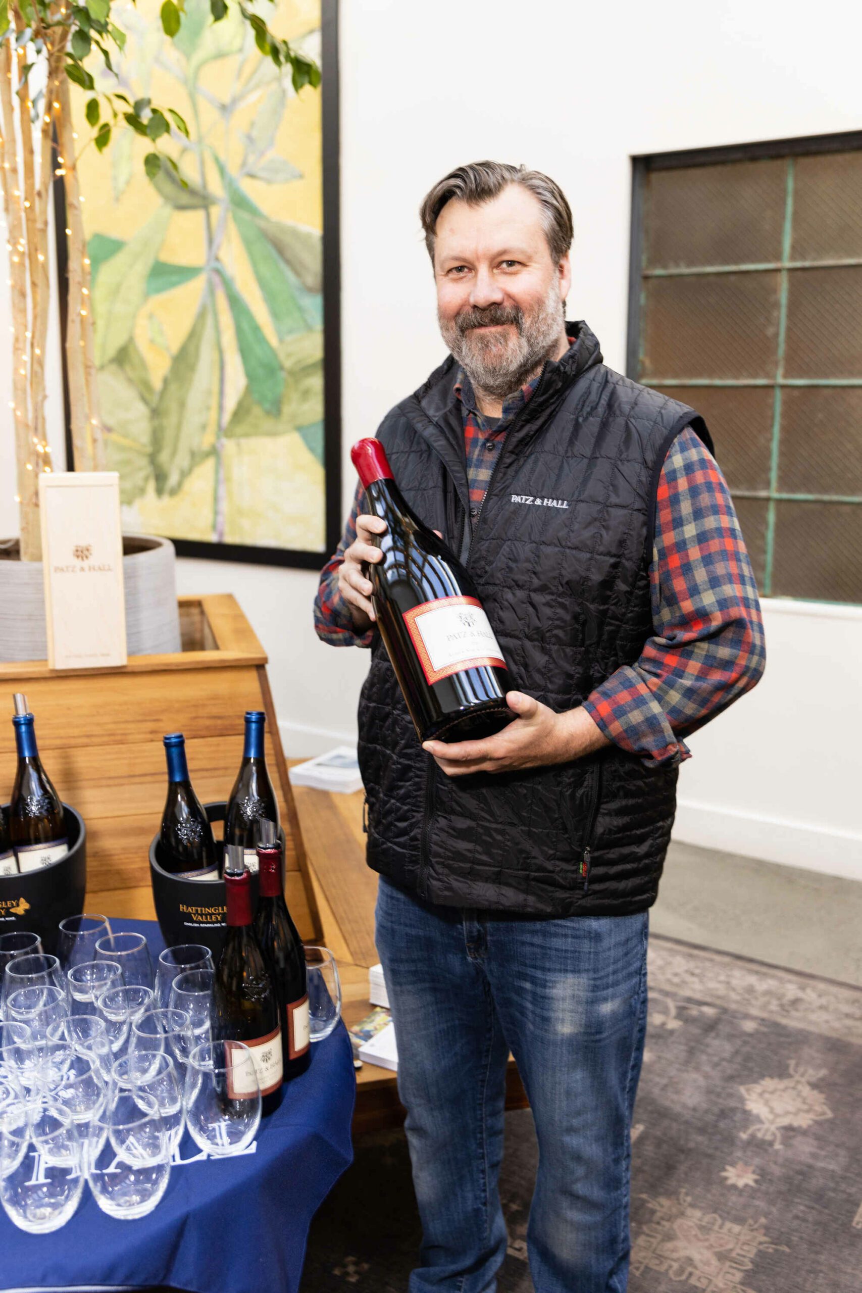 Man with bottles of Patz and Hall wines