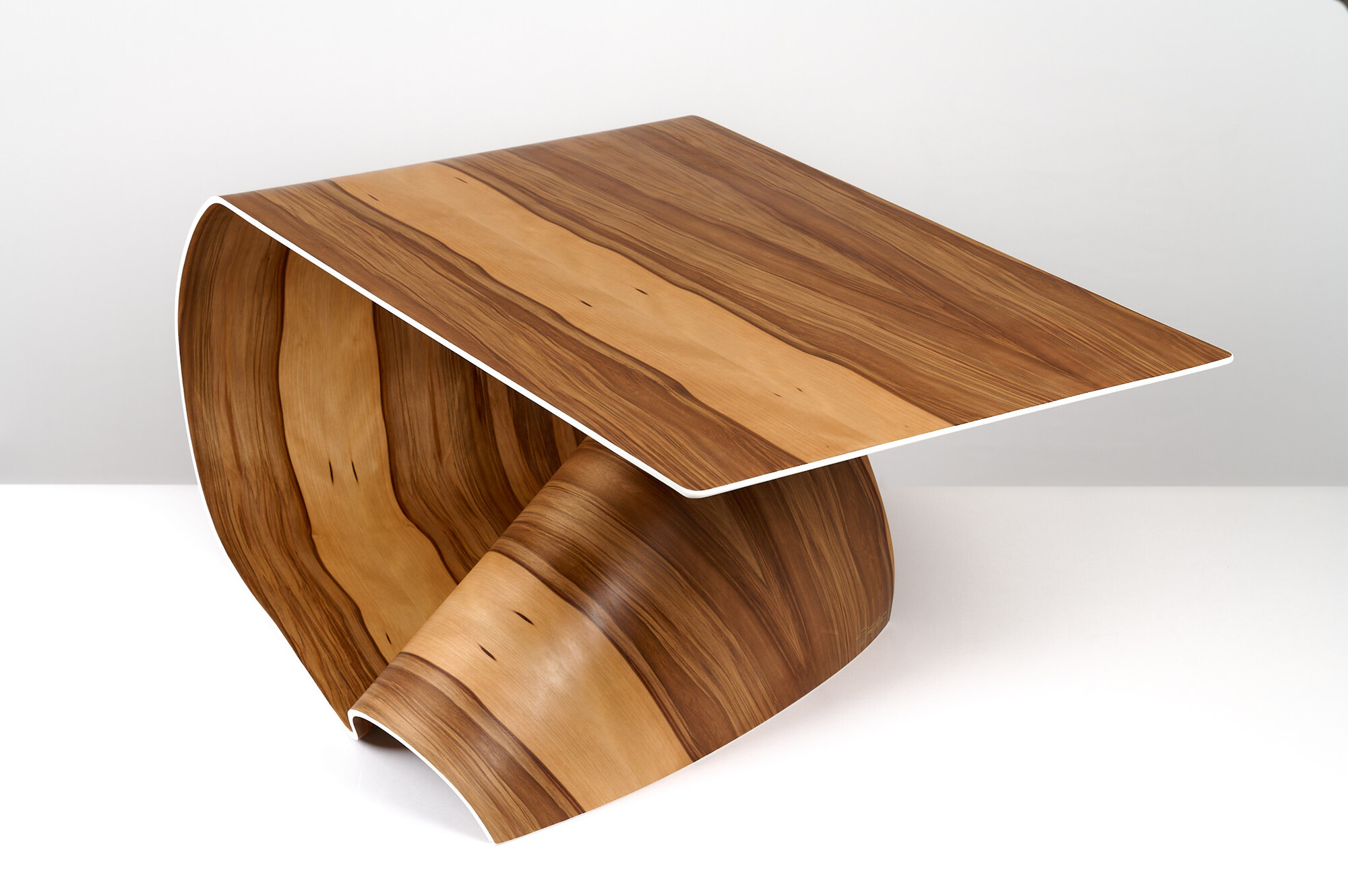 a warped wood coffee table