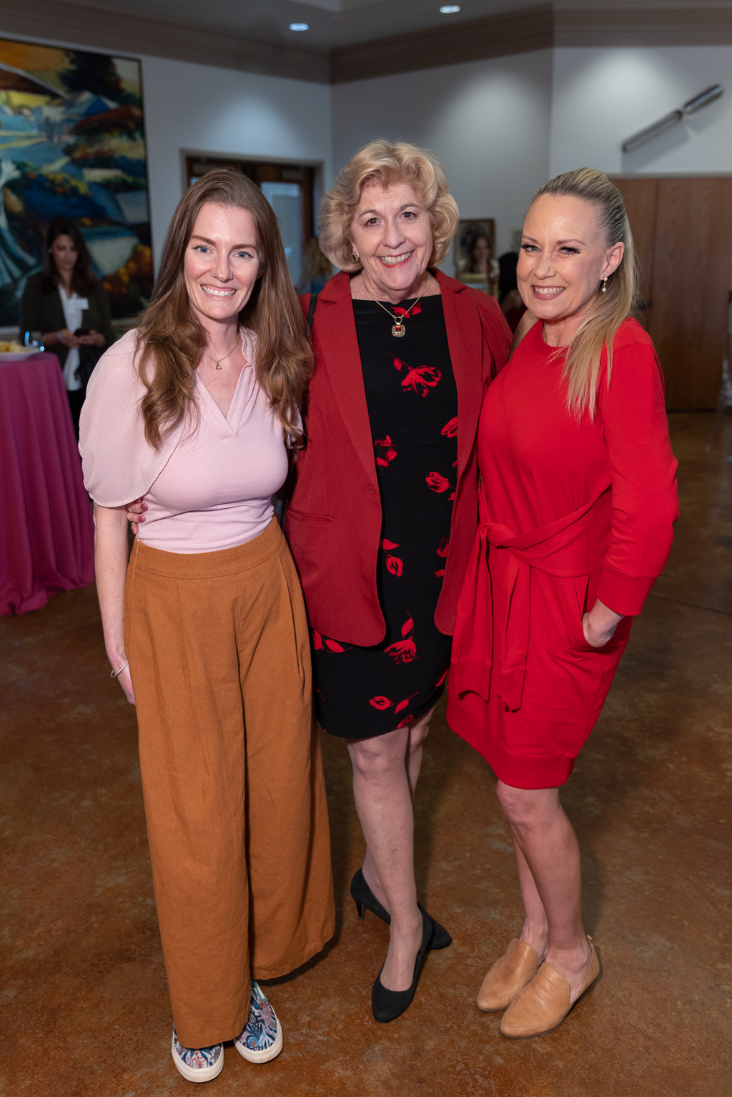 three party attendees at the groundbreaking women event