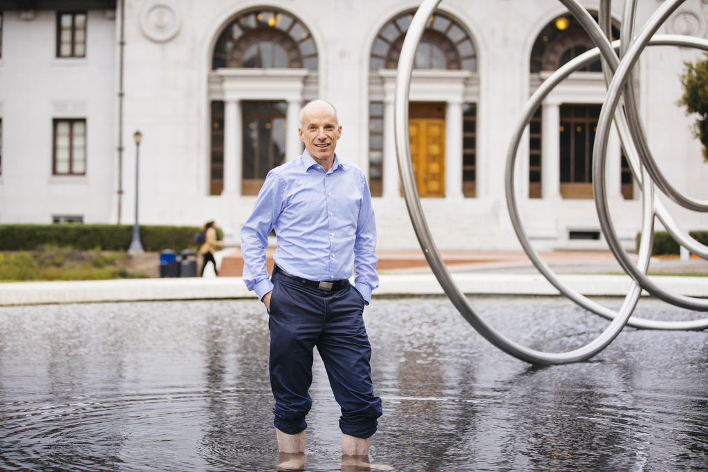 David Sedlak stands in a fountain