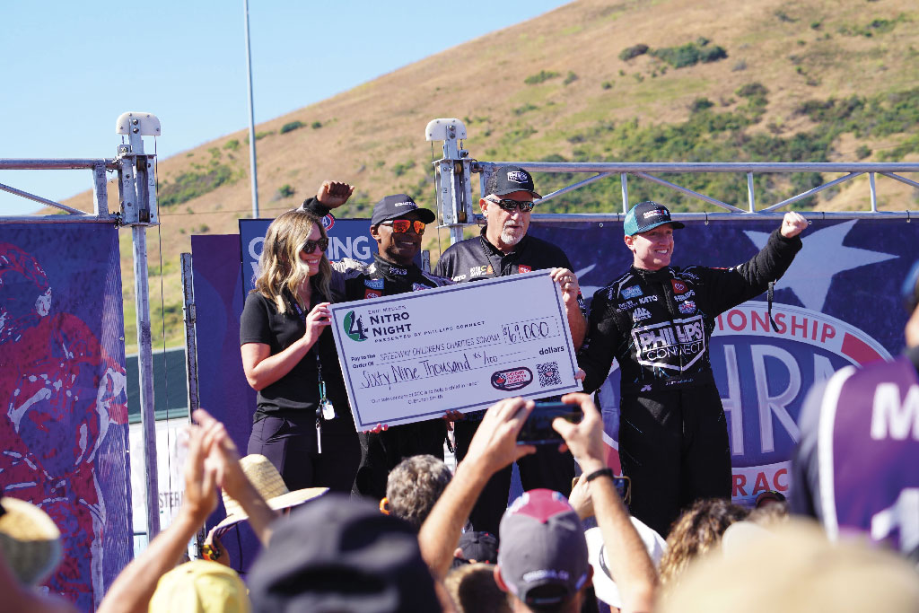 A check is presented at Sonoma Raceway