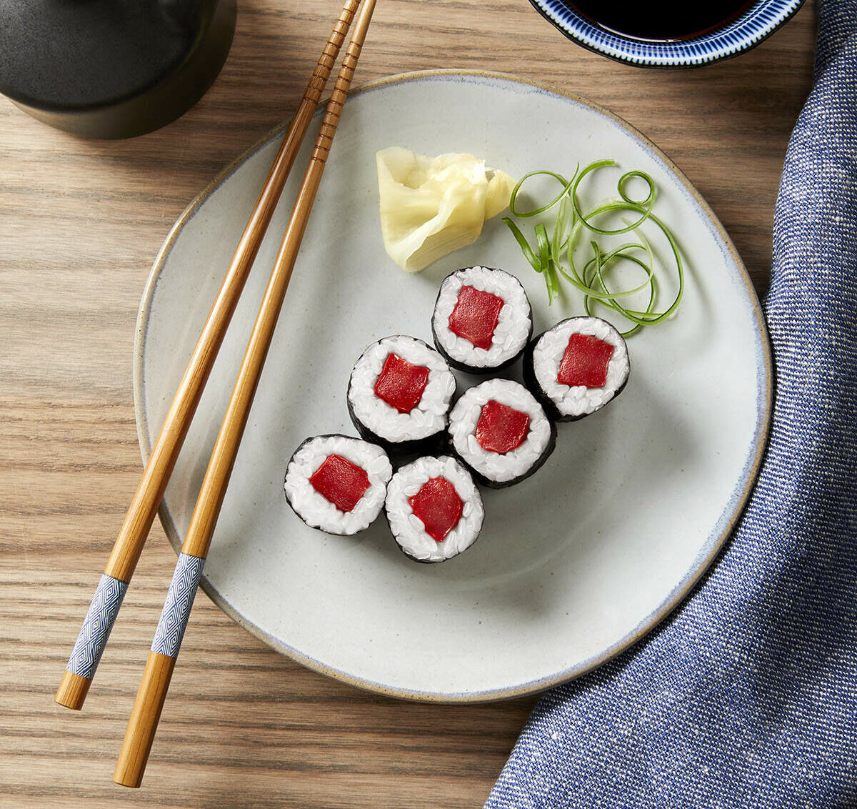 a plate of cell-cultured tuna roll sushi