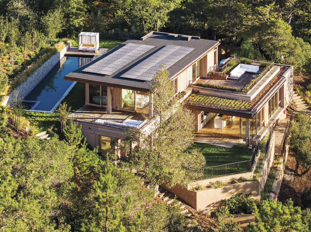 drone shot of a hillside luxury home