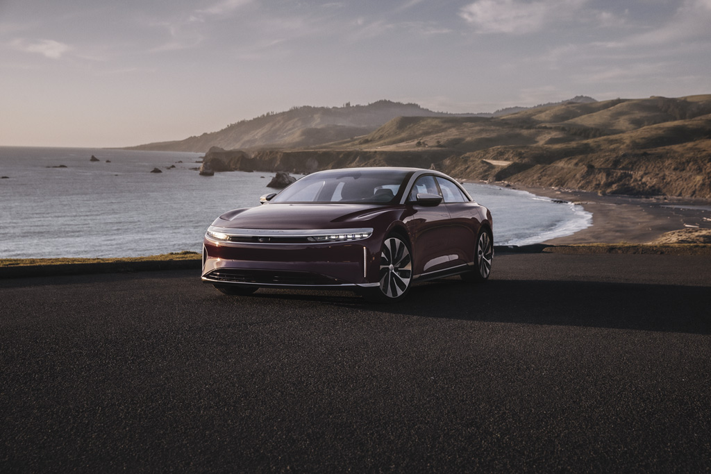 Lucid Air Grand Touring parked by the beach