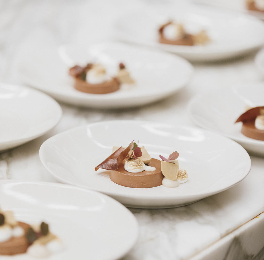 a setting of plated desserts