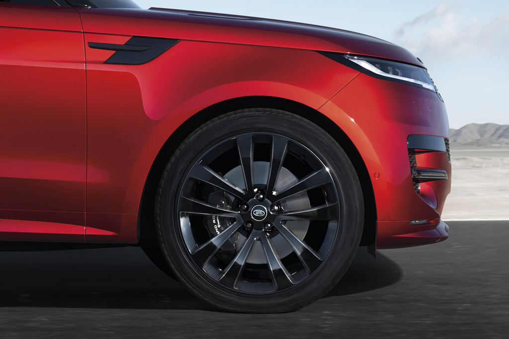 close up image of a red range rover sport